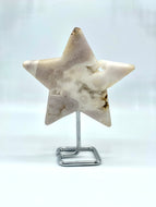 pink amethyst star on metal stand 