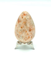 Load image into Gallery viewer, Sunstone egg on metal stand