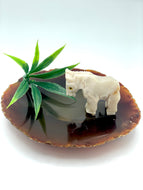 White dolomite horse on agate slice
