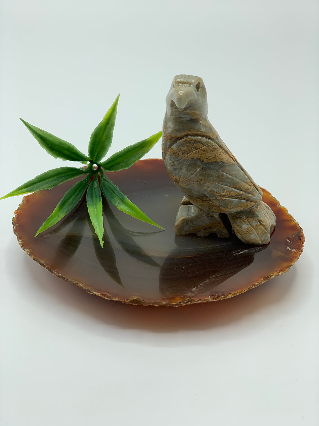 Large dolomite eagle on agate. 