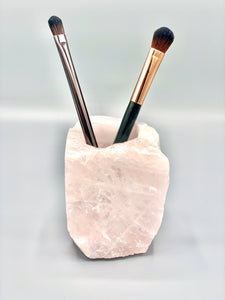 make up brushes in rose quartz holder
