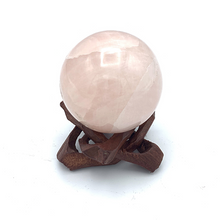 Load image into Gallery viewer, brown wooden stand with rose quartz sphere 
