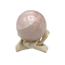 Load image into Gallery viewer, light brown wooden stand with rose quartz sphrere 
