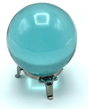 Load image into Gallery viewer, close up of aqua blue obsidian sphere on silver stand
