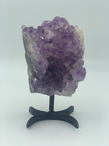 Amethyst on black metal stand