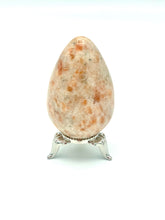 Load image into Gallery viewer, Sunstone egg on metal stand 
